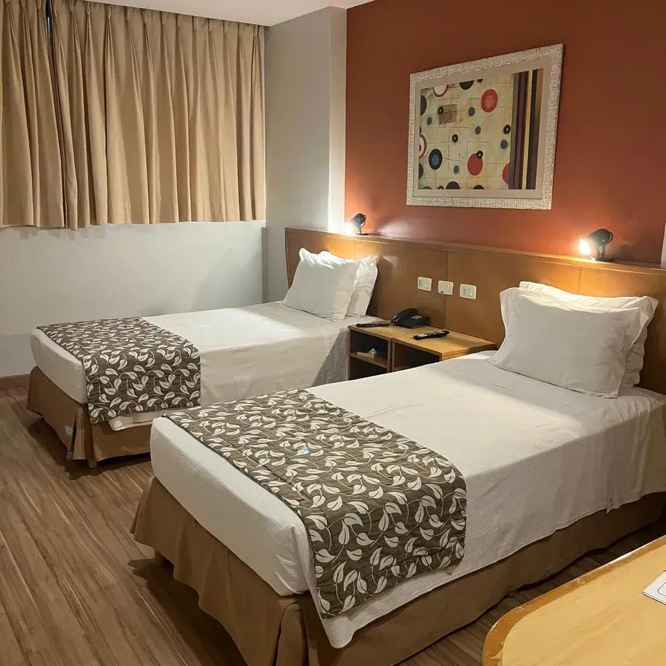 Scorial-Quarto-Standard-com-2-Camas-de-Solteiro-02