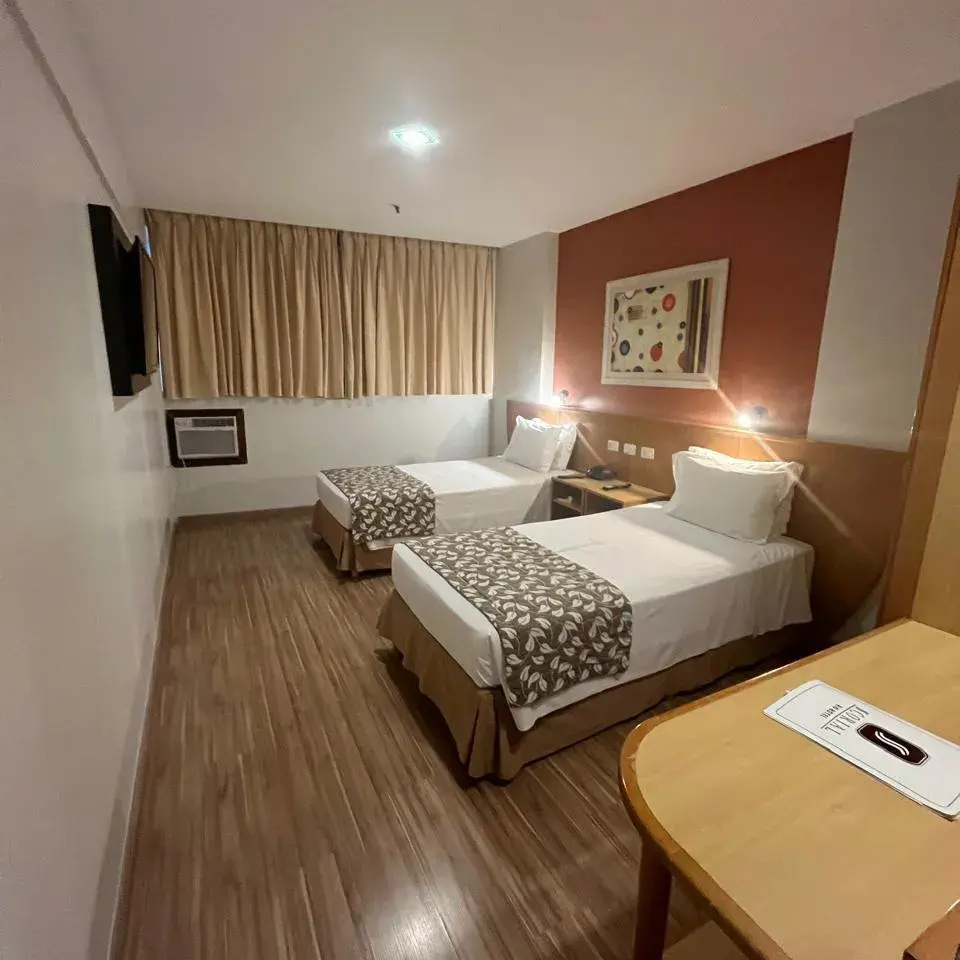 Scorial-Quarto-Standard-com-2-Camas-de-Solteiro-03